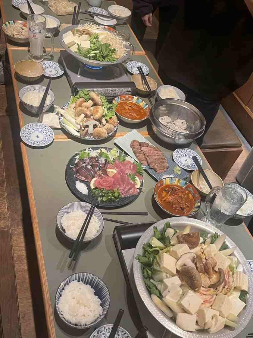 鮮魚と炉端焼き 魚丸 彦根店の制服9