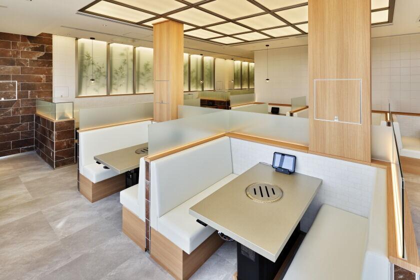 食道園 みのおキューズモール店の制服4