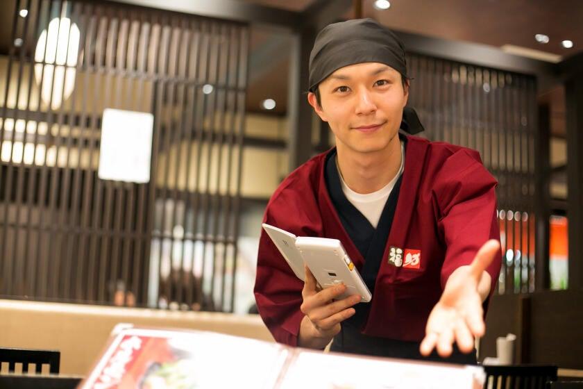 牛たん福助 高知店の制服4