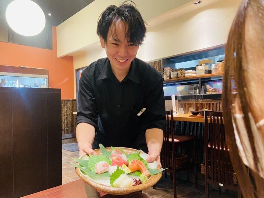 魚輝水産　湯里店の制服2