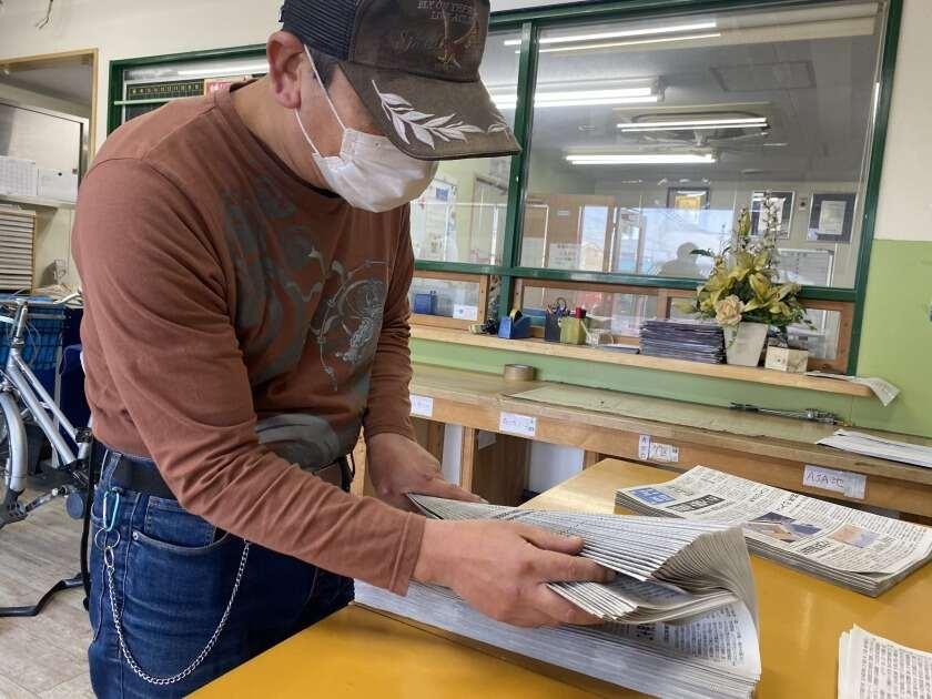 毎日新聞 瓢箪山南販売店の制服1