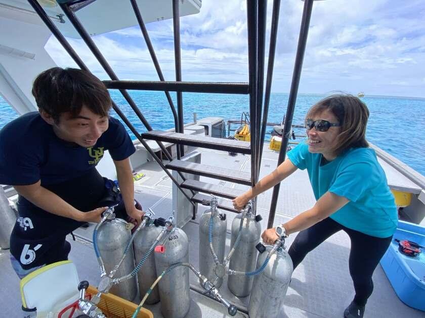 ダイビングチームうなりざき_沖縄の西表島！移住も大歓迎！寮と食事付きで安心◎の制服1