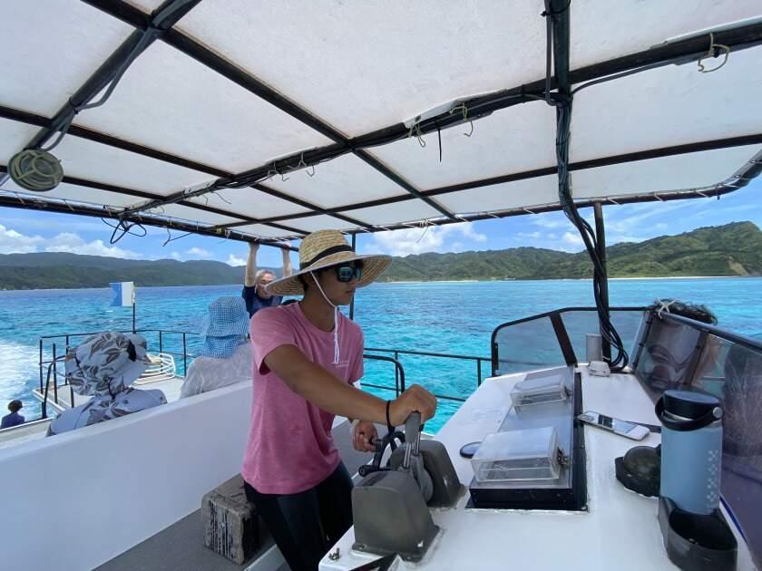 ダイビングチームうなりざき_沖縄の西表島！移住も大歓迎！寮と食事付きで安心◎の制服4