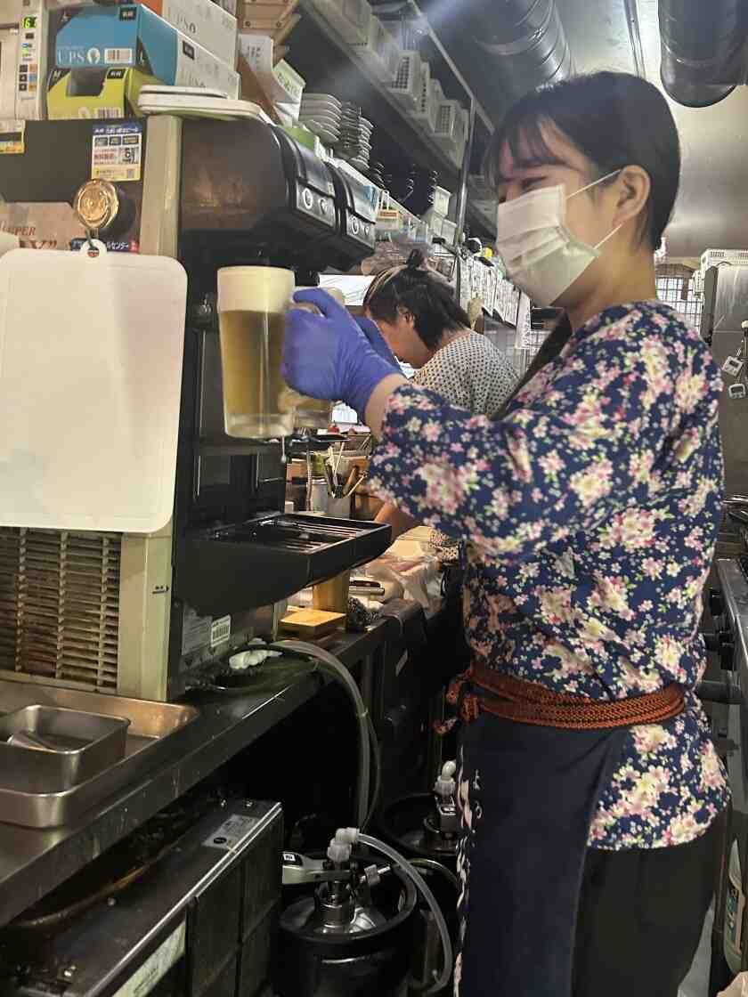 寿司と焼き鳥 大地 鶴瀬店の制服6
