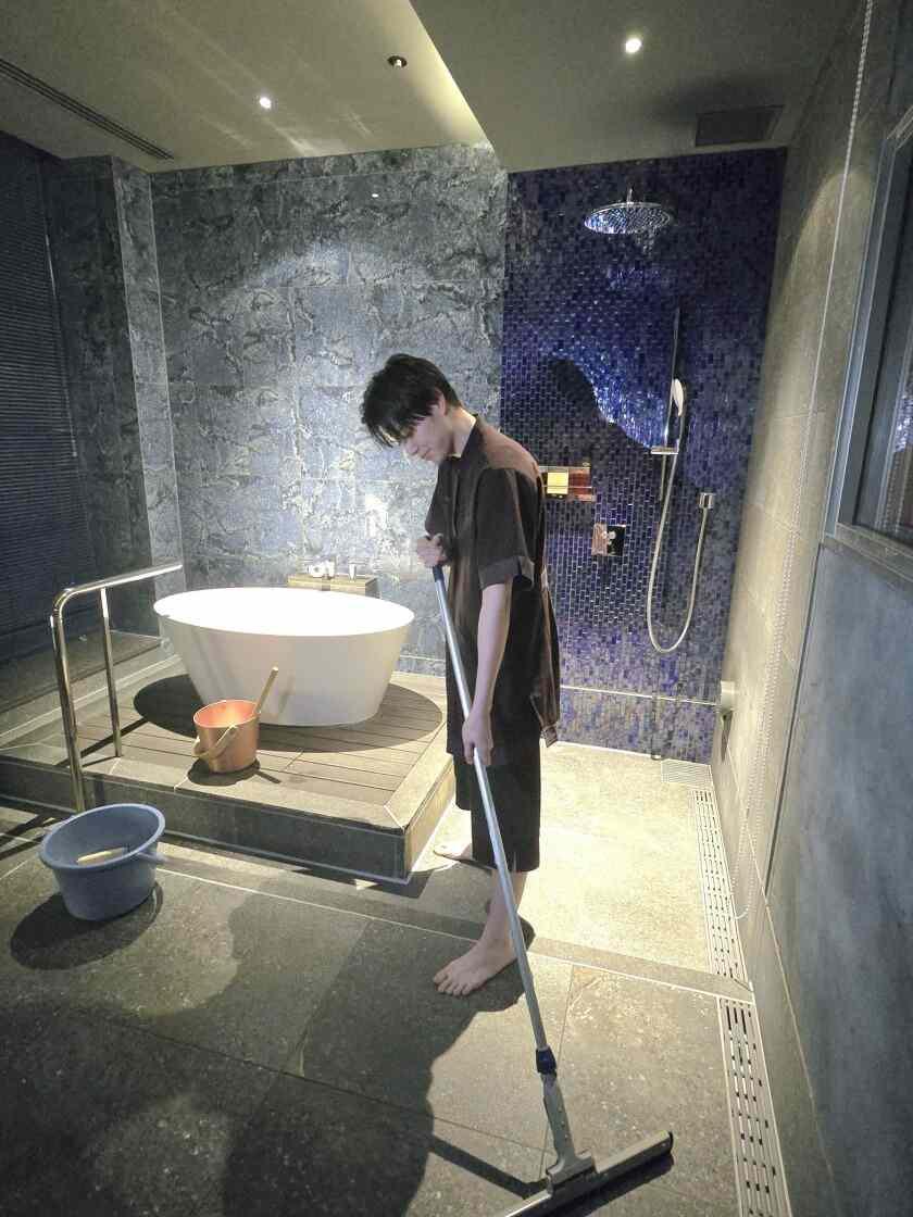 株式会社東京ドームスポーツ Spa LaQua (スパラクーア)の制服1