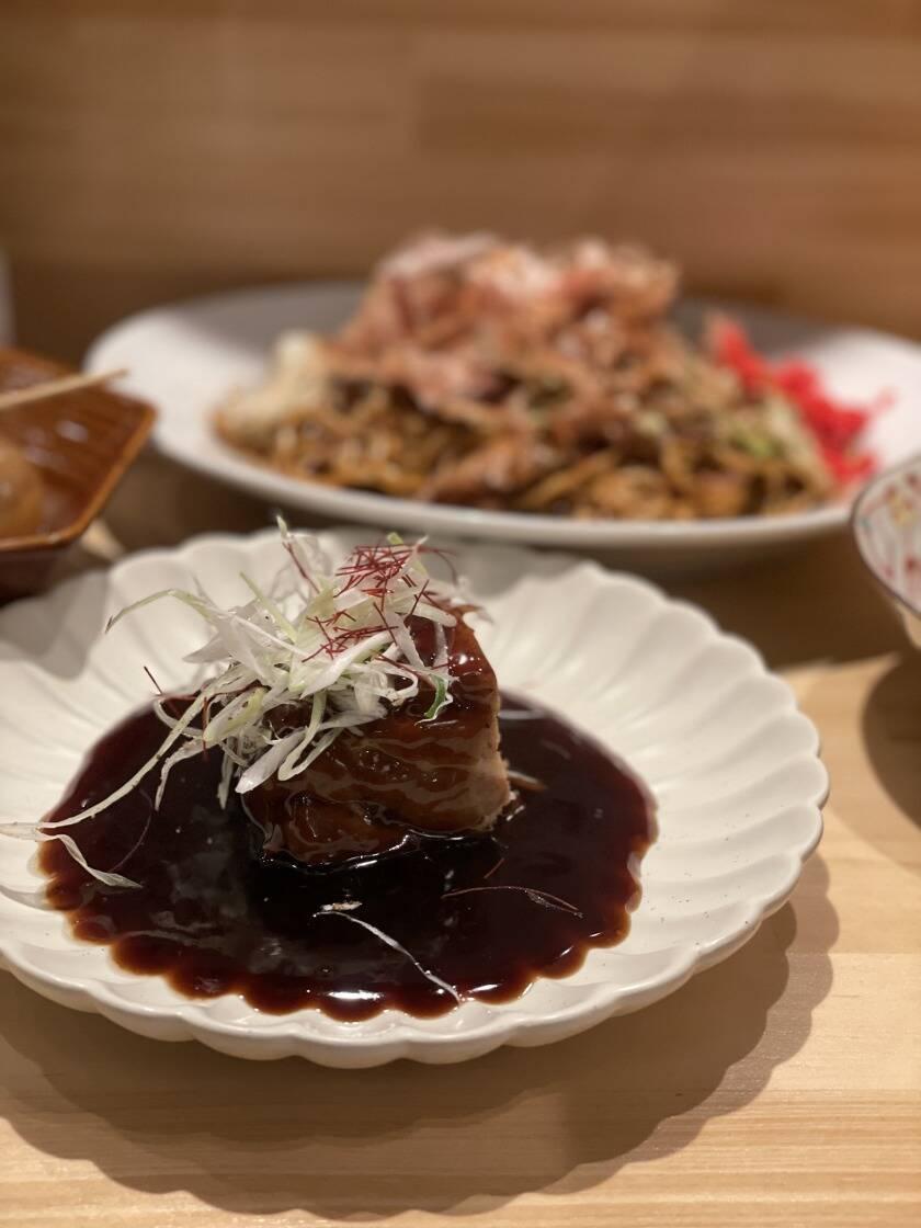 黒たぬき 大阪駅前第2ビル店の制服5