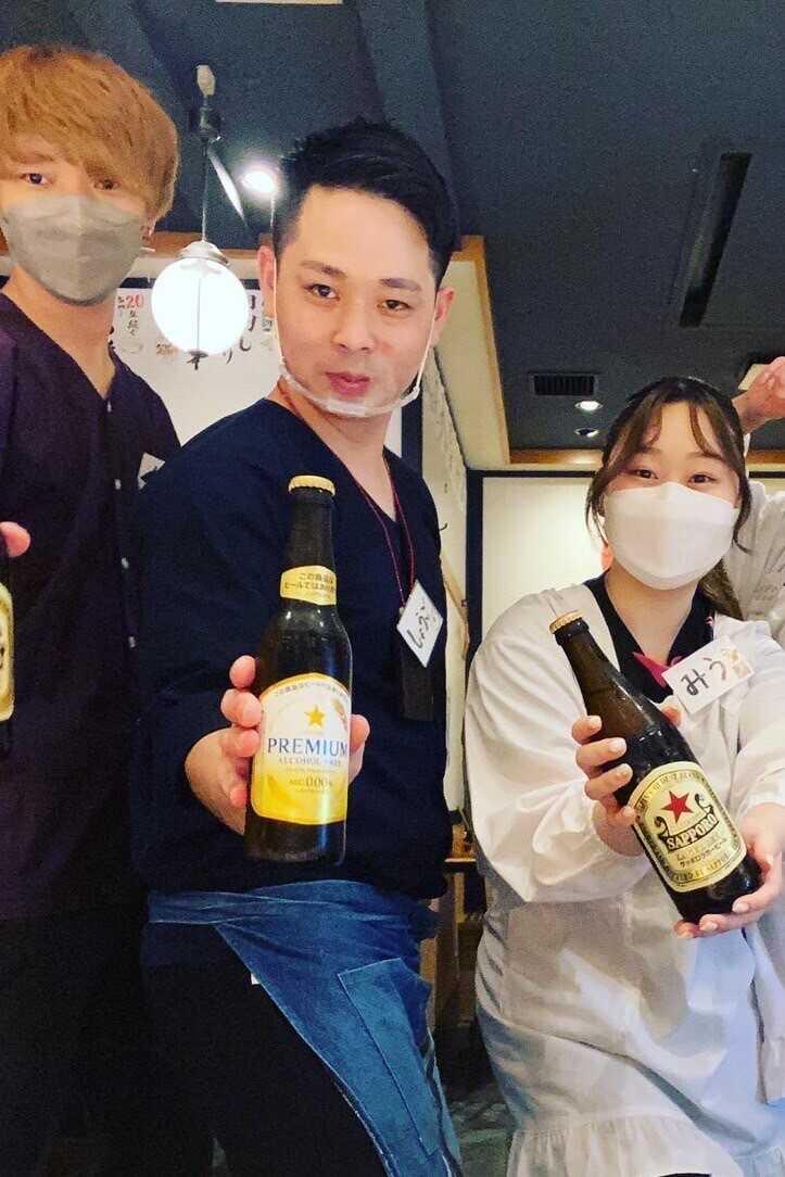 坐もつ焼き いしん 新宿大ガード店の制服6