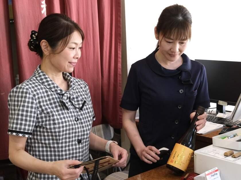 IZUMIYA株式会社 本社SHOPの制服3
