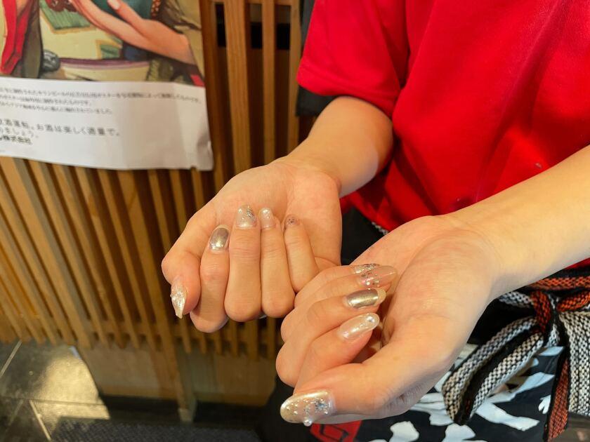 博多の大衆料理 喜水丸 KITTE博多9F(明太子食べ放題で、もつ鍋・水炊きが人気!)の制服2