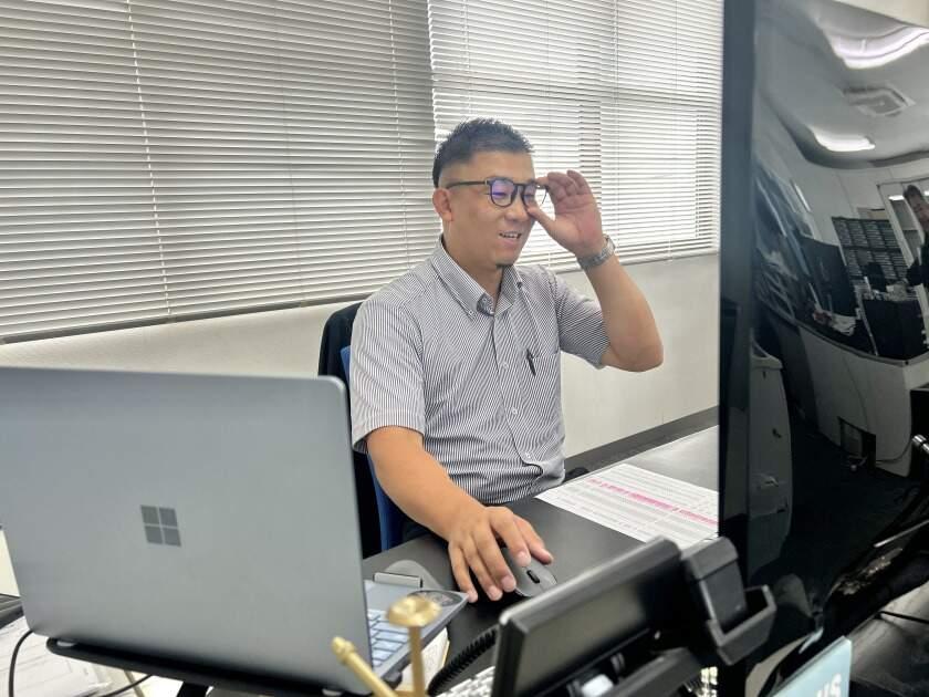 株式会社YTR 大阪オフィスの制服2