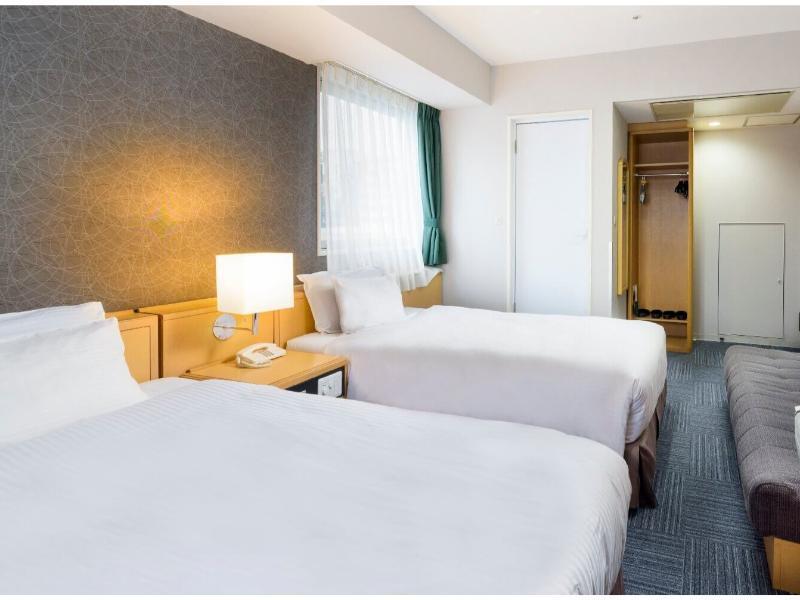 シュアステイプラスホテル by ベストウェスタン新大阪の制服3