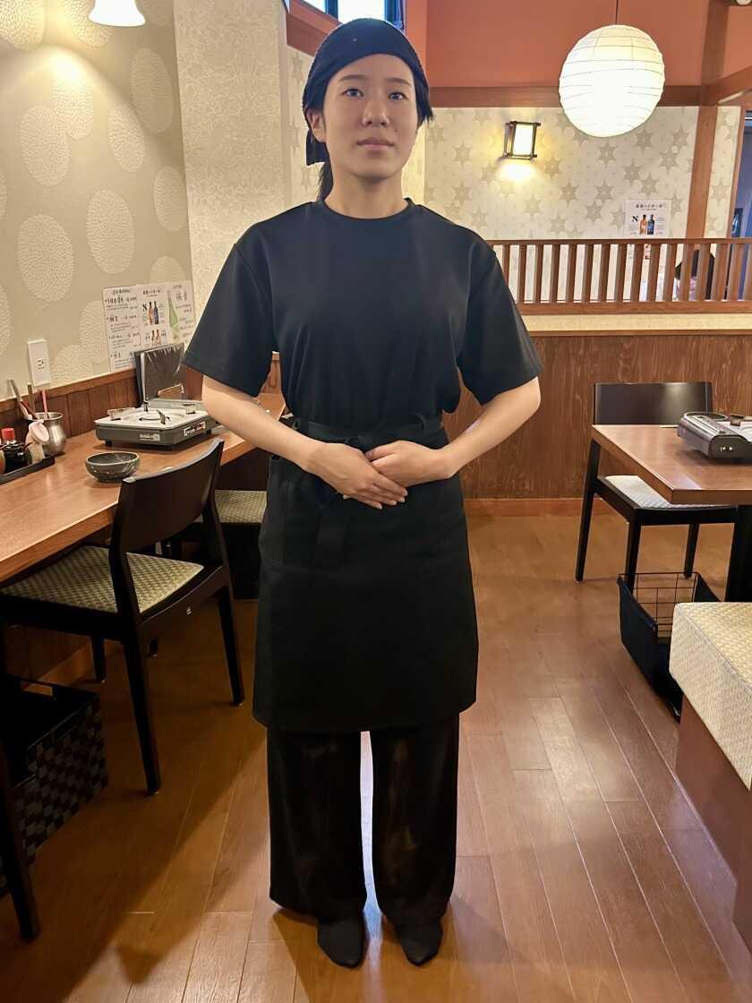 牛もつどて鍋 まつい亭の制服6