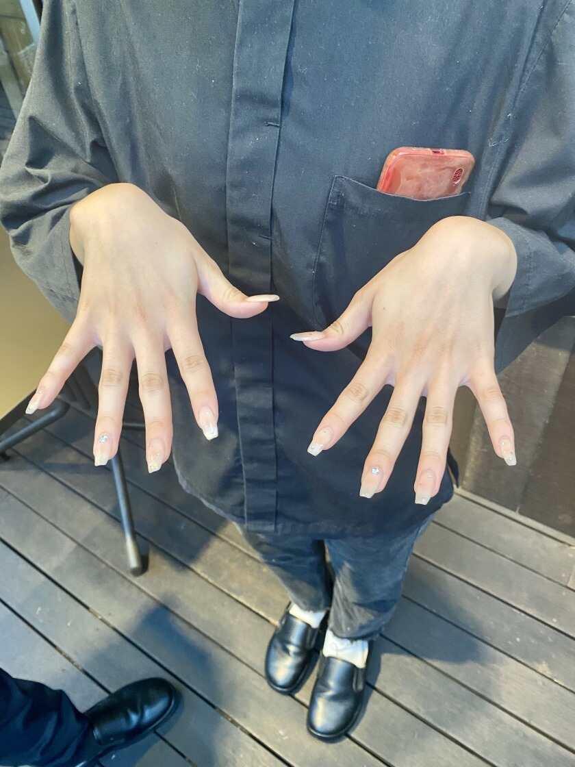 天ぷら串焼き 米福酒場 あべのルシアス店の制服5