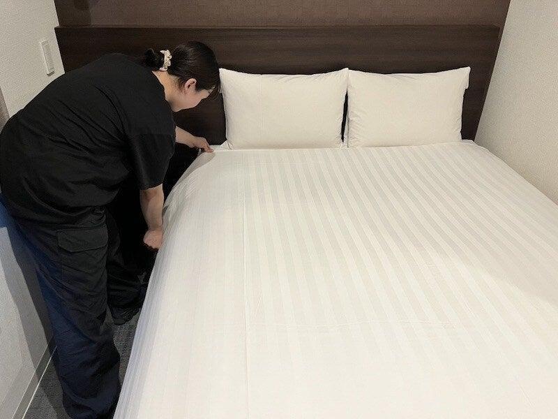株式会社ナインアワーズ スマートプレイスイン京都四条大宮駅の制服1